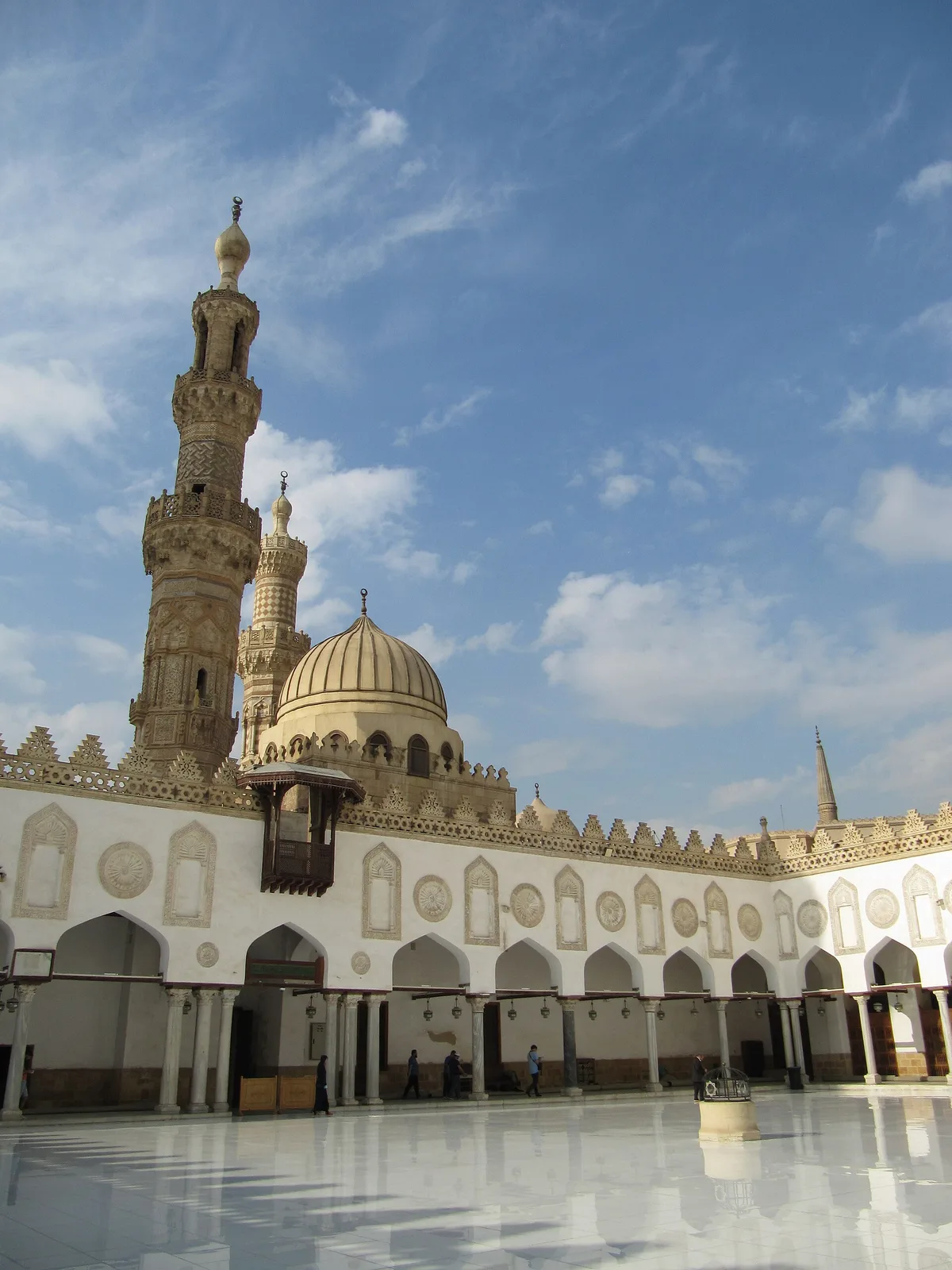 Al-Azhar Mosque in Cairo - A Fatimid-era mosque with multiple courtyards, five minarets from different periods, and a...