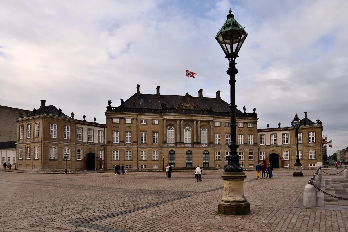 Christian VIII's Palace in Copenhagen - A three-storey rococo palace of pale rendered brick, the northwestern face of...