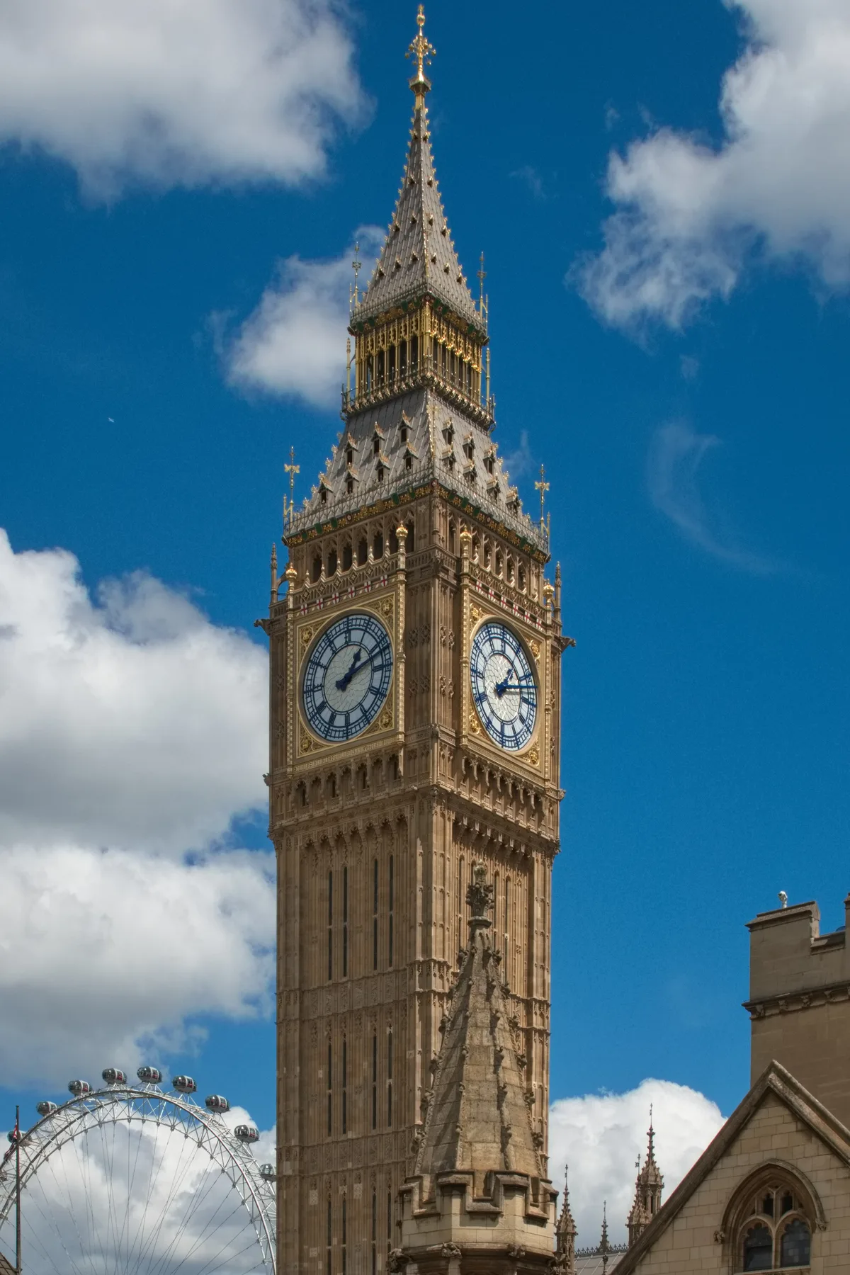 Big Ben in London - A 96-metre Gothic Revival clock tower rising from the Palace of Westminster, with a four-faced...