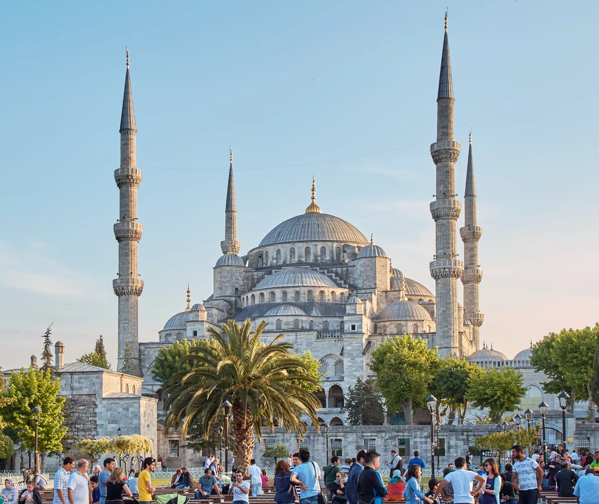 Blue Mosque in Istanbul - A cascading series of domes and semi-domes, framed uniquely by six slender minarets directly...