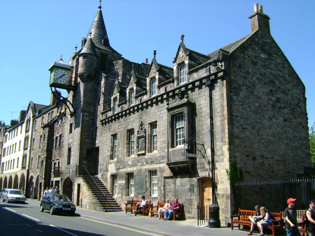 Canongate Tolbooth in Edinburgh - The 16th-century tower on the Royal Mile with its clock hanging over the street and the arch of Tolbooth Wynd passing beneath