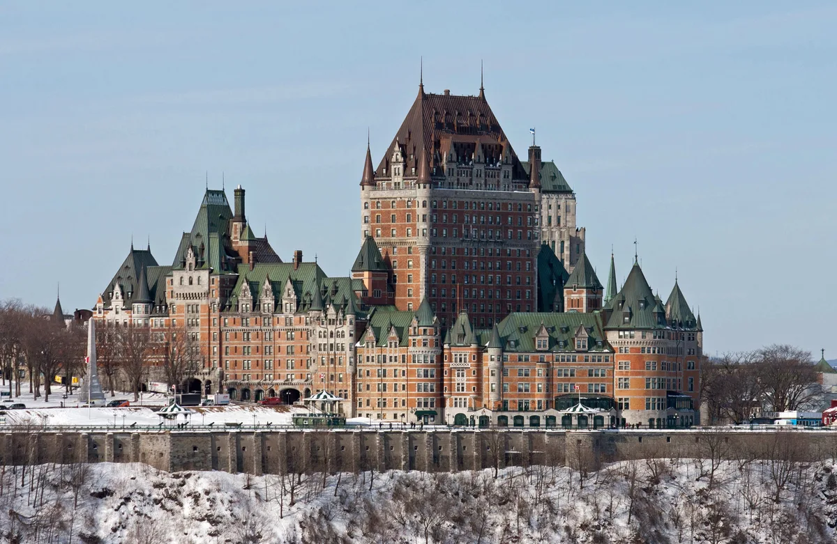 Château Frontenac in Québec City - A Châteauesque hotel of steep copper roofs, turrets and a central tower crowning Cap Diamant above the St. Lawrence