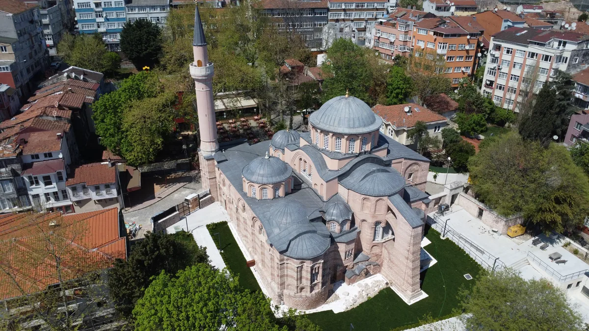 Chora Church in Istanbul - A modest stone church with brick courses, a large central dome, and multiple smaller domes...