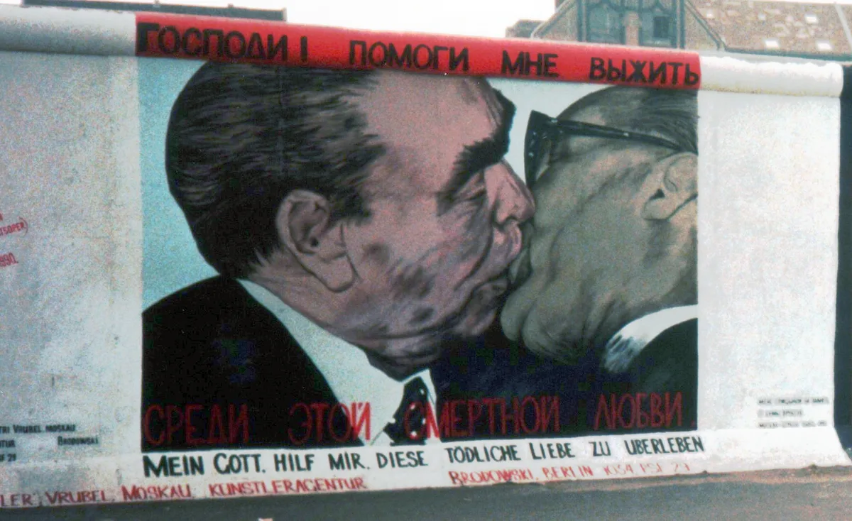 East Side Gallery in Berlin - A 1.3-kilometre section of the Berlin Wall covered in colourful murals, stretching along...