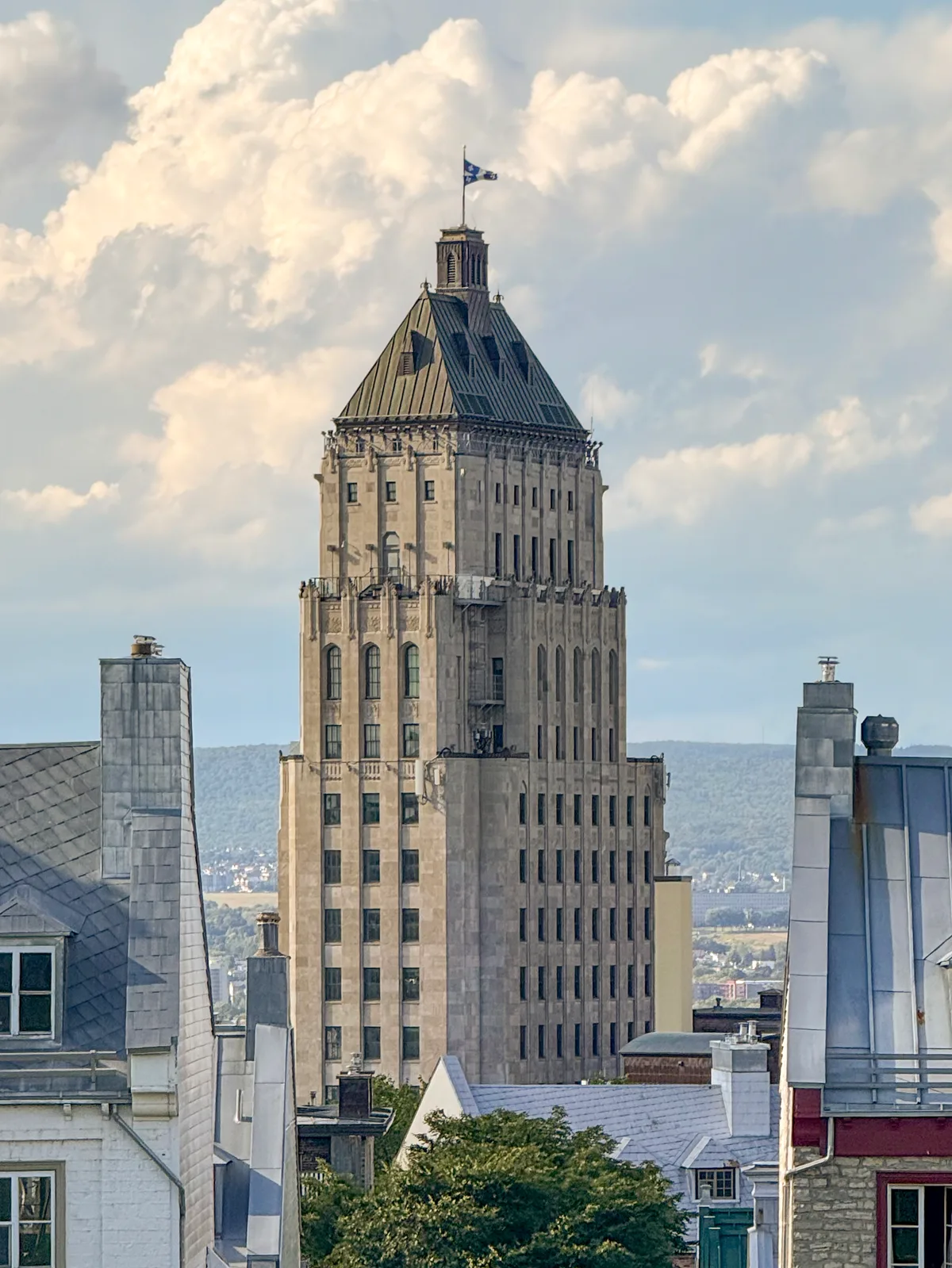 Édifice Price in Québec City - An 18-storey Art Deco skyscraper with stepped limestone cladding, crowned by a copper pyramid roof