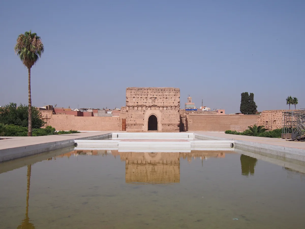 El Badi Palace in Marrakech - An enormous ruined palace of sunken gardens, reflecting pools, and crumbling walls, with...