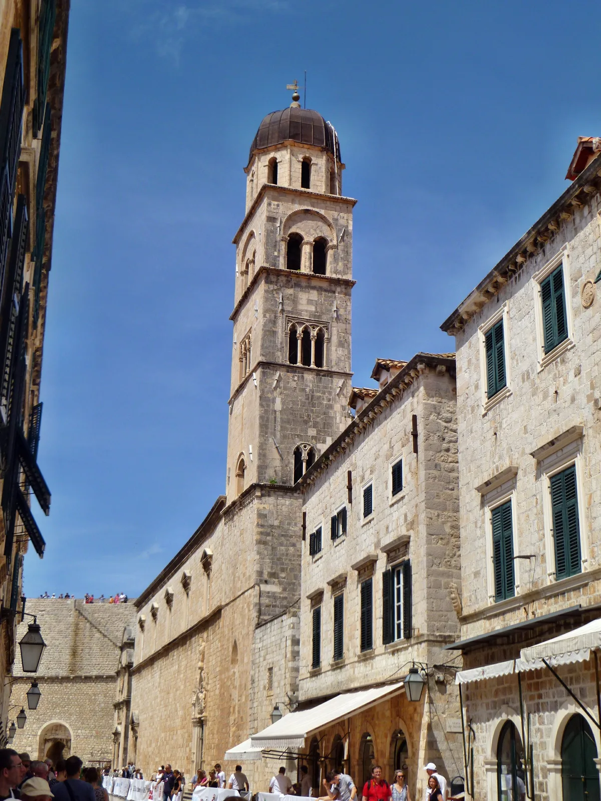Franciscan Monastery & Old Pharmacy in Dubrovnik - Inside the Pile Gate, a Romanesque south portal with a carved Pietà...