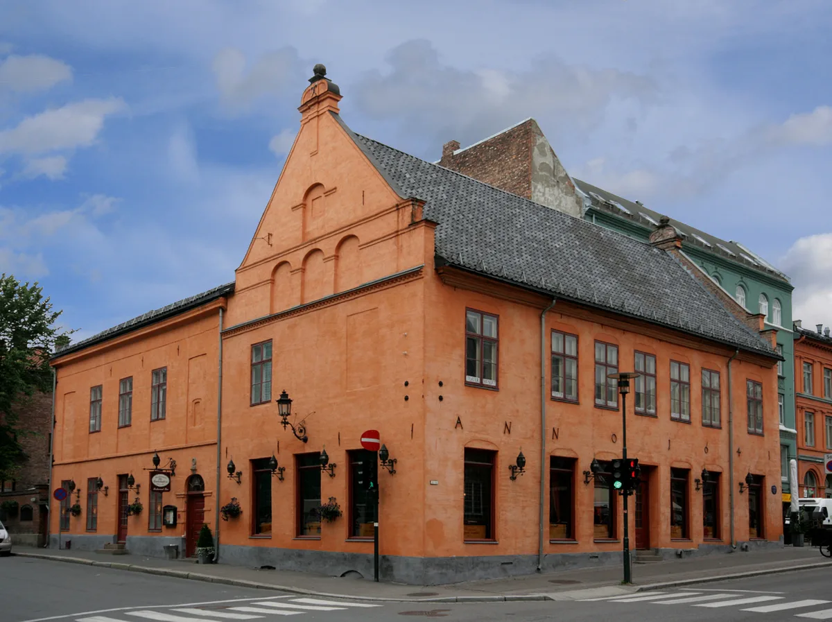 Gamle rådhus in Oslo - A two-storey brick building with a tower and stepped gables, standing just south of Christiania...
