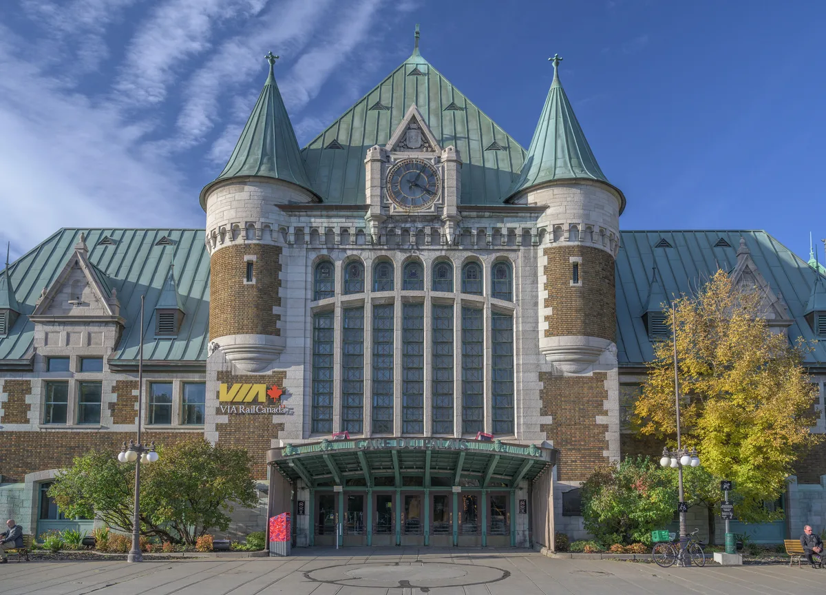 Gare du Palais in Québec City - A château-style stone station with steep copper roofs, turrets and a huge leaded-glass window over the entrance