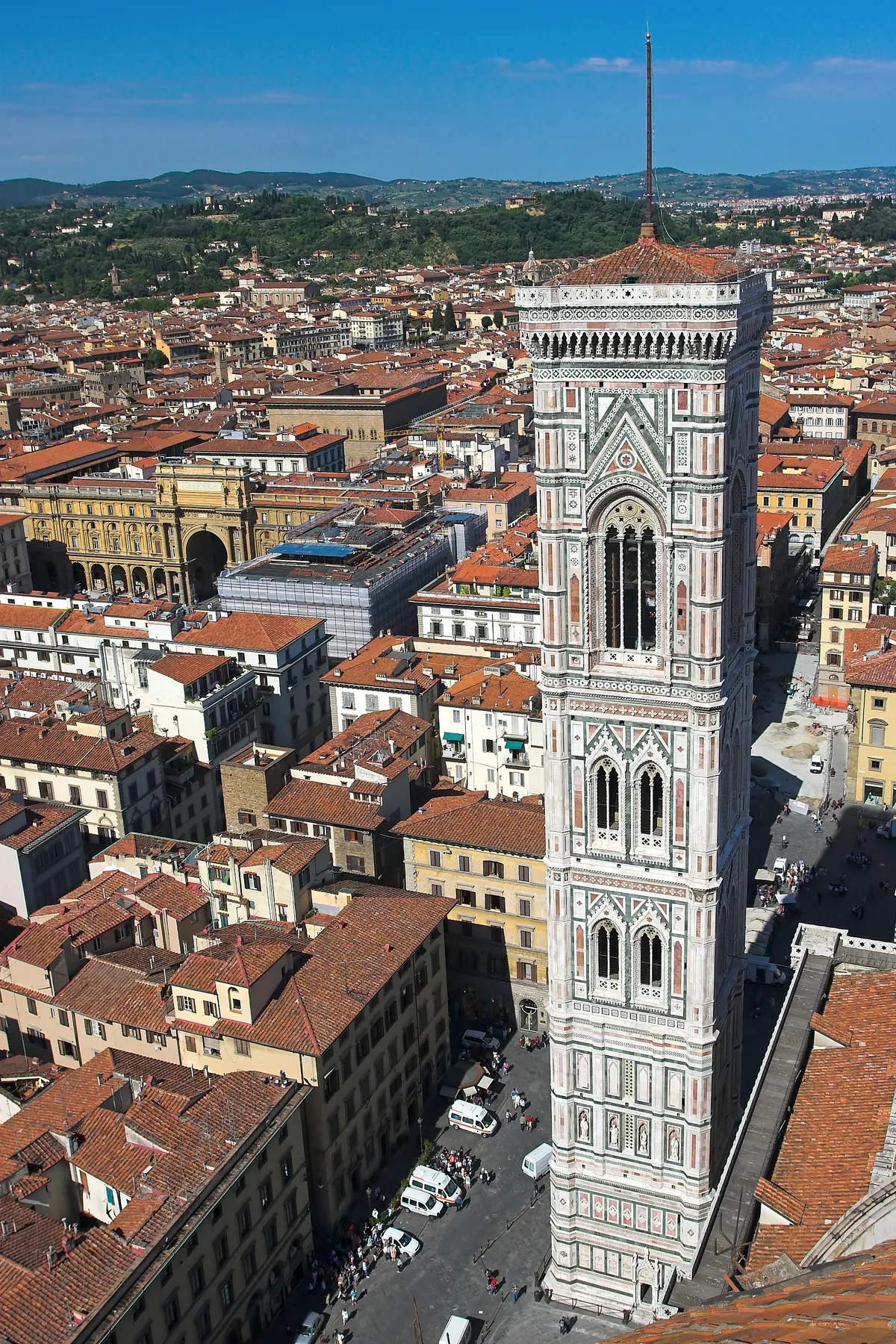 Giotto's Campanile in Florence - A slender square bell tower rising 84.7 metres beside the cathedral, clad in bands of...