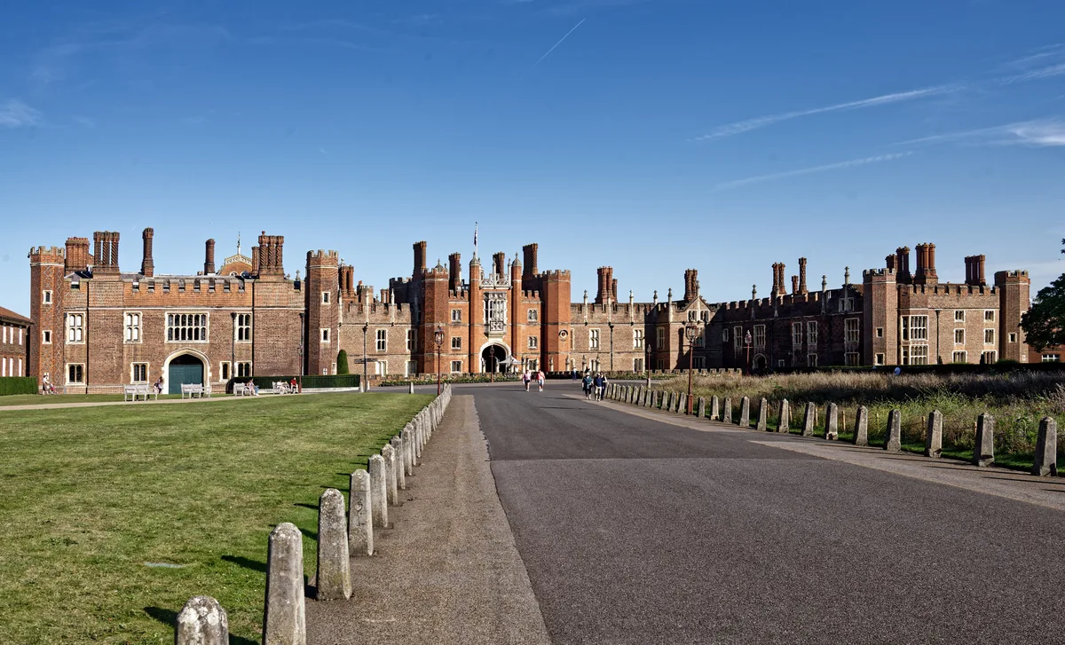 Hampton Court Palace in London - A sprawling red-brick Tudor palace beside the Thames, with Anne Boleyn's Gatehouse...