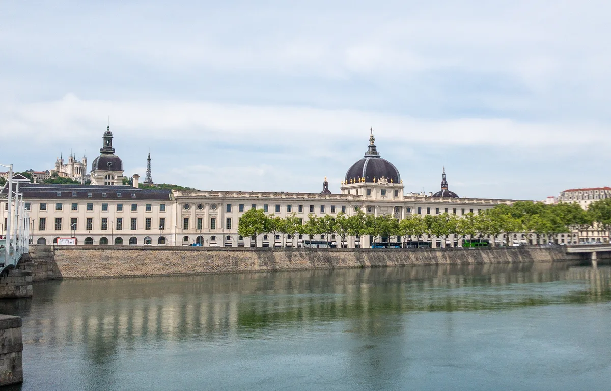 Grand Hôtel-Dieu in Lyon - long neoclassical riverside façade dominated by a central dome