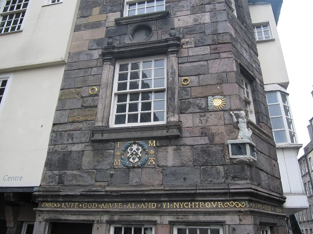 John Knox House in Edinburgh - The medieval house on the Royal Mile at the Netherbow, its upper storeys jutting out over the pavement and its facade carved with Bible texts and a Moses figure