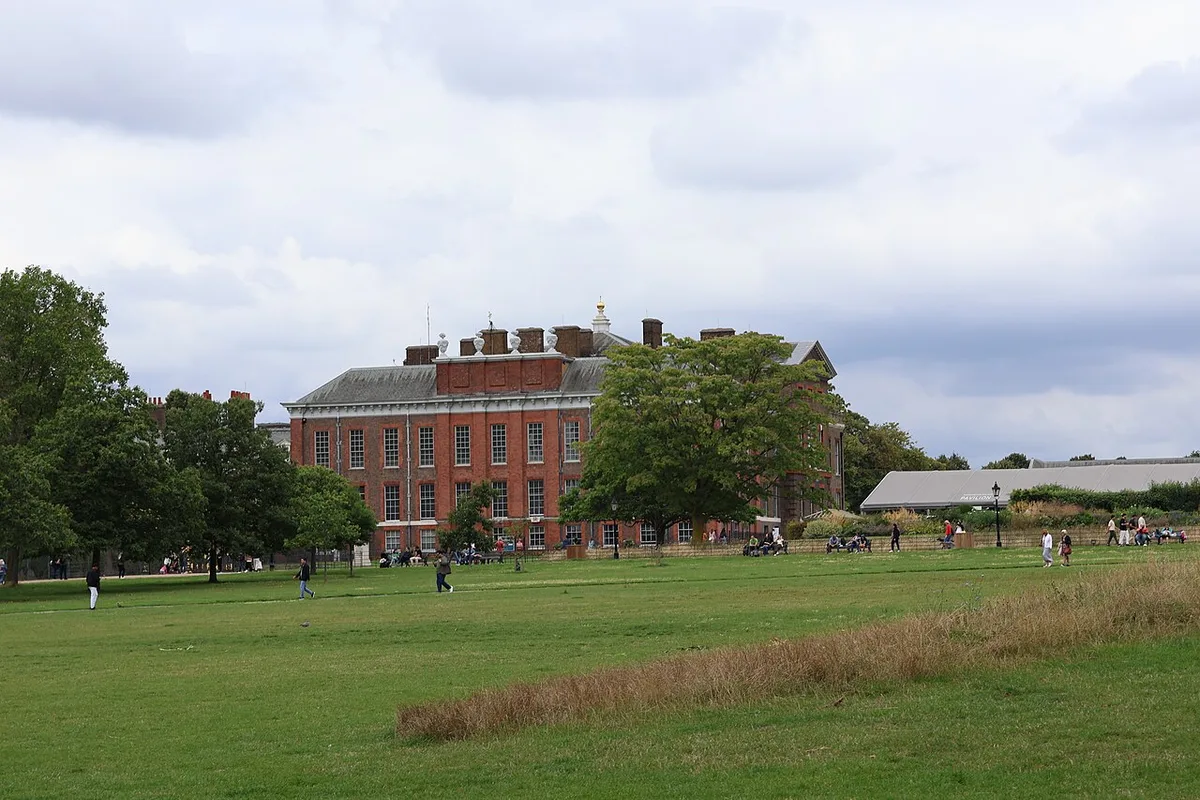 Kensington Palace in London - A comparatively modest red-brick royal palace set in Kensington Gardens, entered beneath...