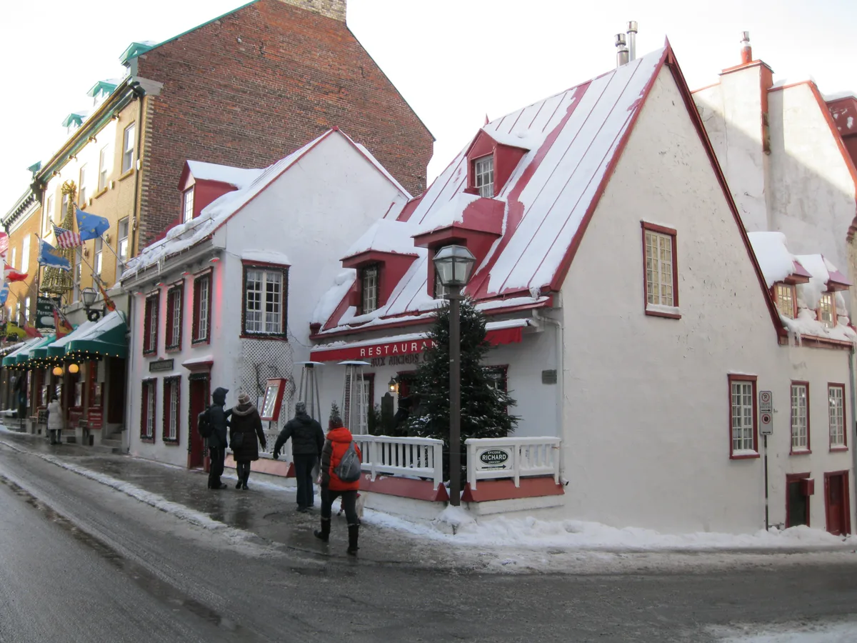 Maison Jacquet in Québec City - A low stone house on Rue Saint-Louis with thick cut-stone walls and two merged gables of the French Regime