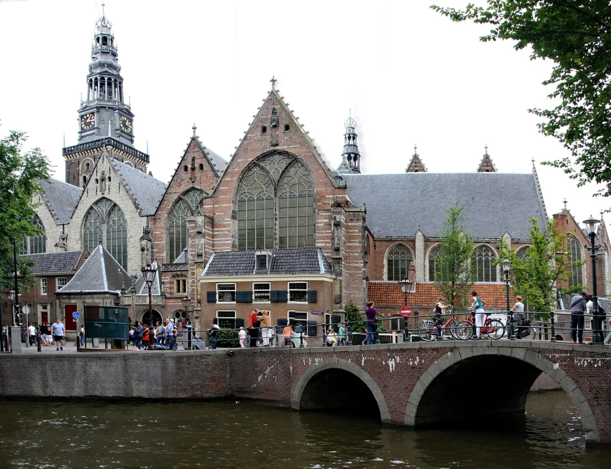 Oude Kerk in Amsterdam - A spacious Gothic basilica with Europe's largest medieval wooden barrel vault, tall...