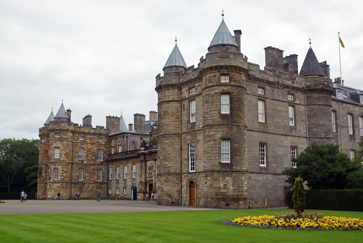 Palace of Holyroodhouse in Edinburgh - The official royal residence at the foot of the Royal Mile, with the roofless ruins of Holyrood Abbey beside it