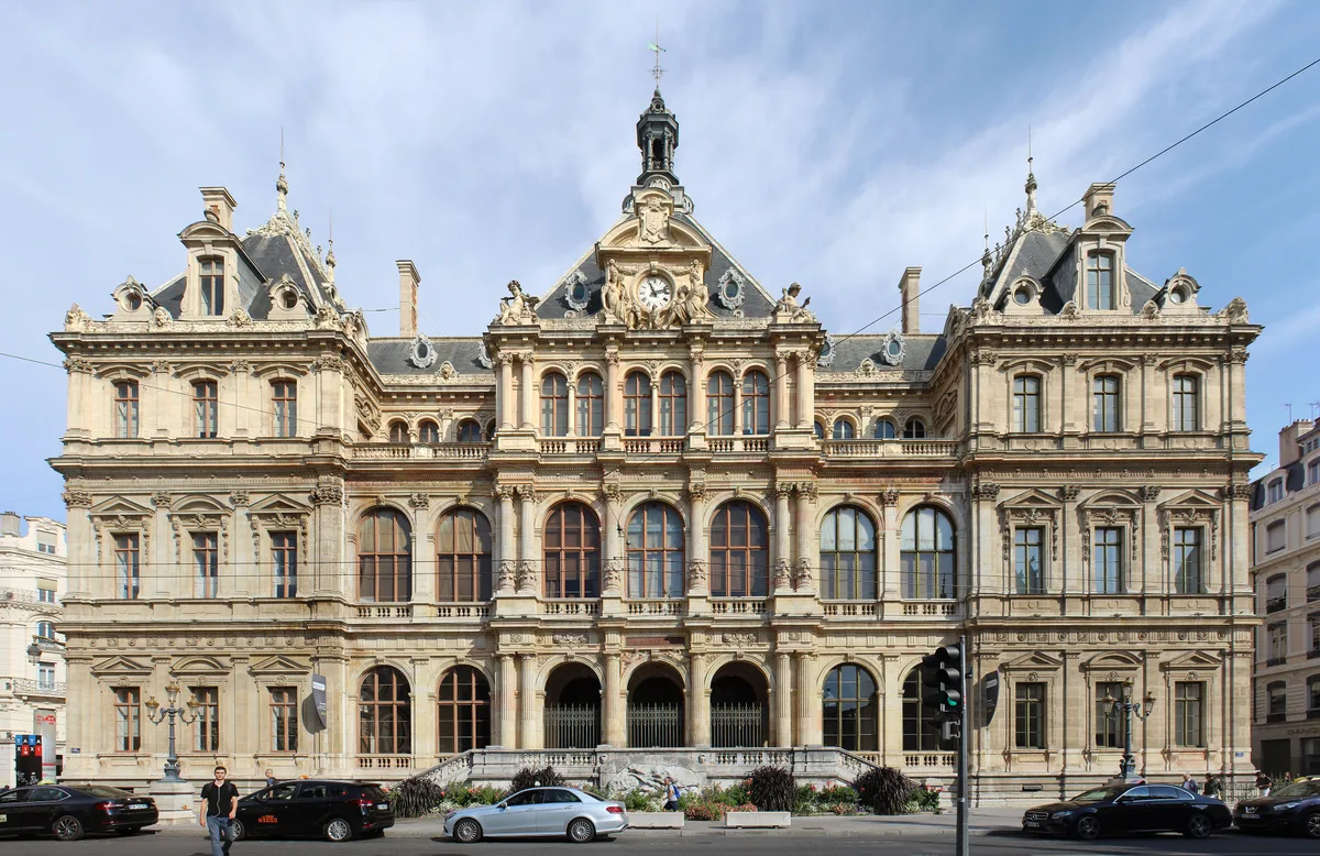 Palais de la Bourse in Lyon - neoclassical stone façade with columns and projecting corner pavilions