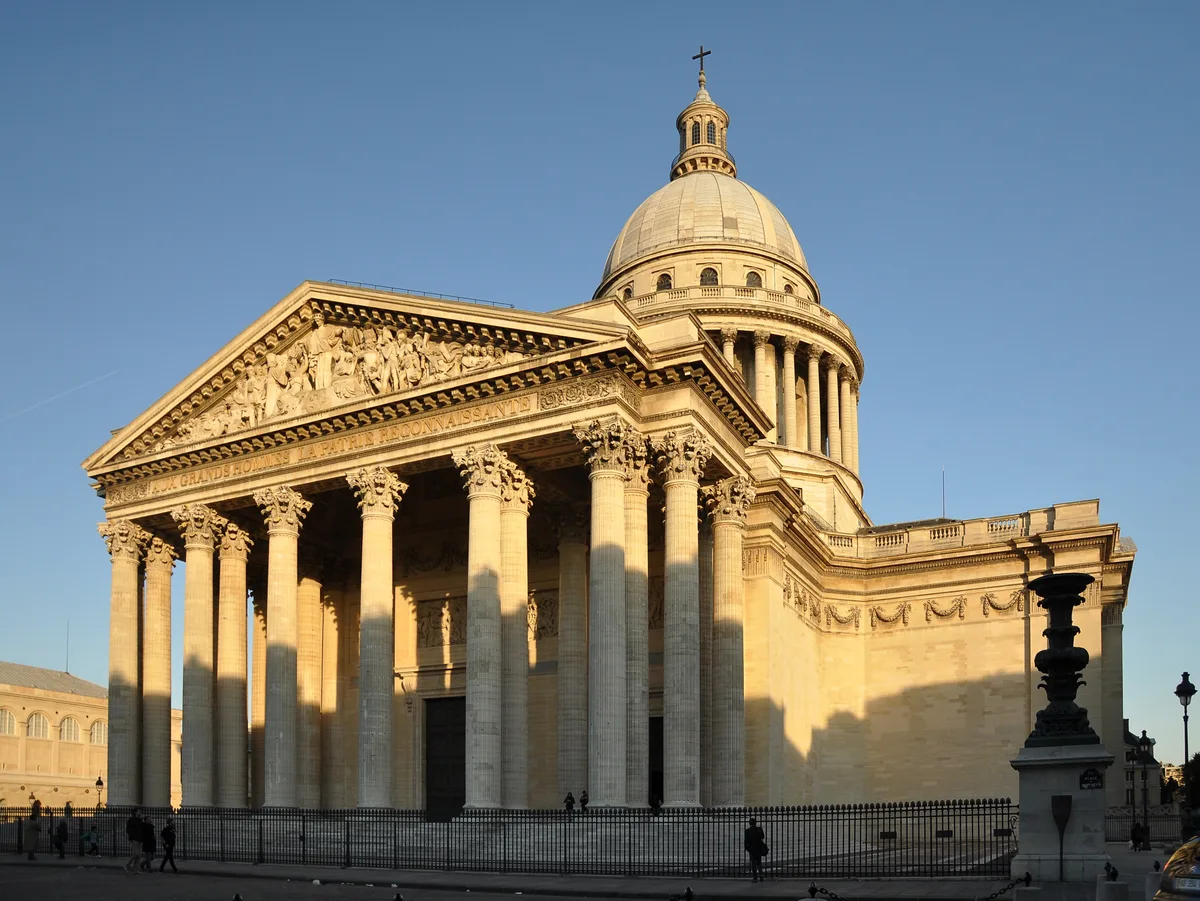 Panthéon in Paris - A neoclassical building crowned by a large dome, sitting atop the Montagne Sainte-Geneviève hill in...