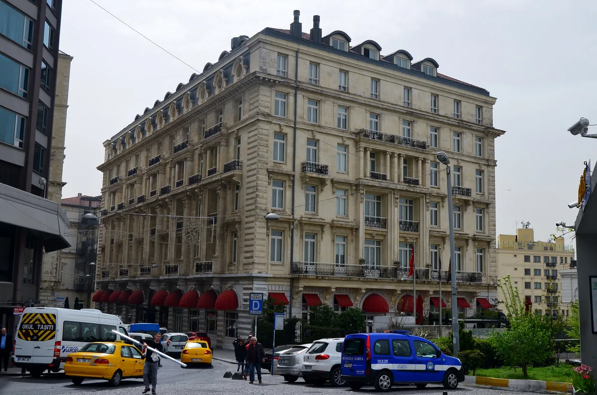 Pera Palace Hotel (Pera Palas) in Istanbul - The grand fin-de-siècle hotel seen from Meşrutiyet Street, its ornate facade rising above the shops along the avenue.