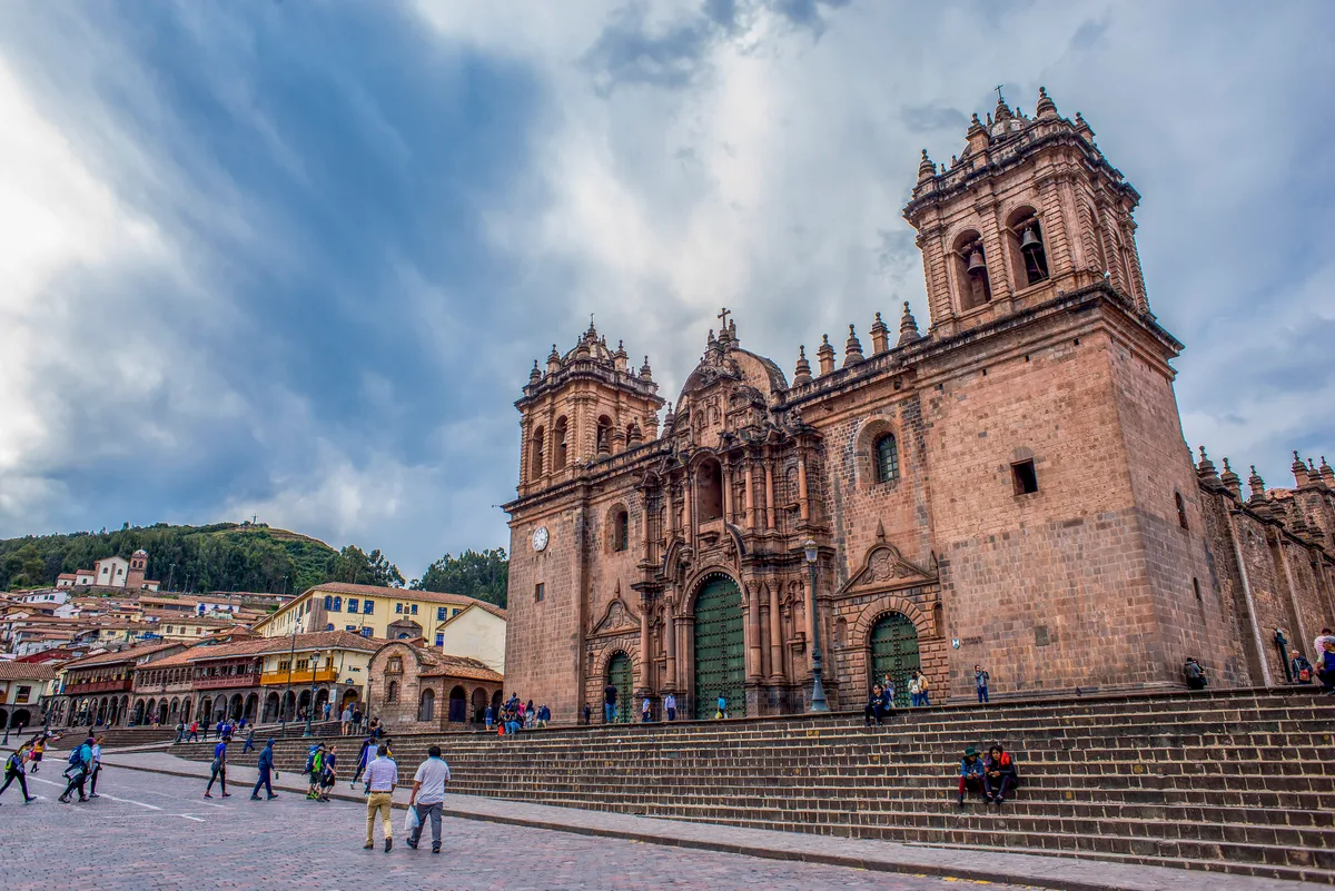 Plaza de Armas & Cusco Cathedral in Cusco - A large cobblestone square flanked by the Cusco Cathedral and the Church of...