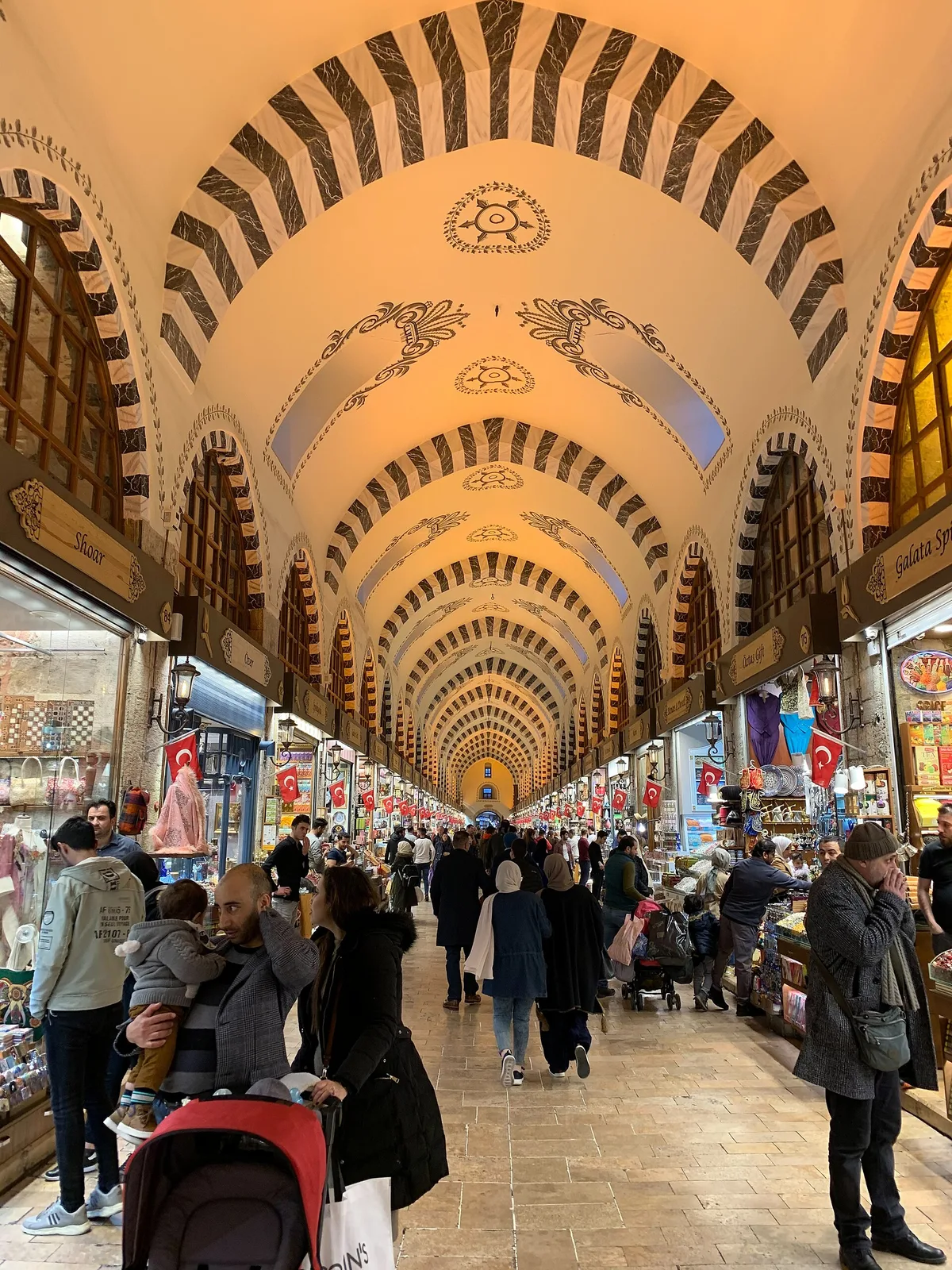 Spice Bazaar in Istanbul - An L-shaped covered market of stone and brick beside the New Mosque, its vaulted walkways...