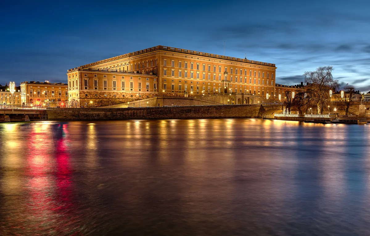 Stockholm Palace in Stockholm - A vast, austere Baroque palace forming a hollow square on the edge of Gamla Stan, with...
