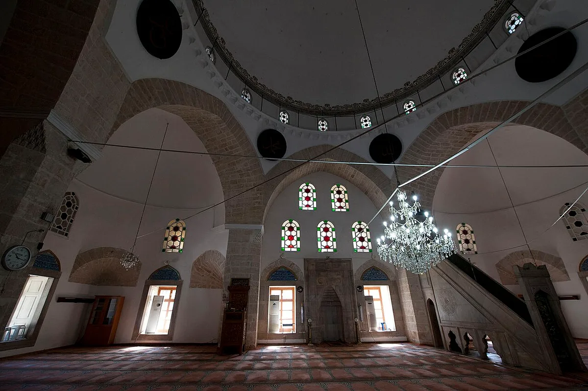 Tekeli Mehmet Pasha Mosque in Antalya - A white cut-stone Ottoman mosque beside Antalya's old town gate, its single...