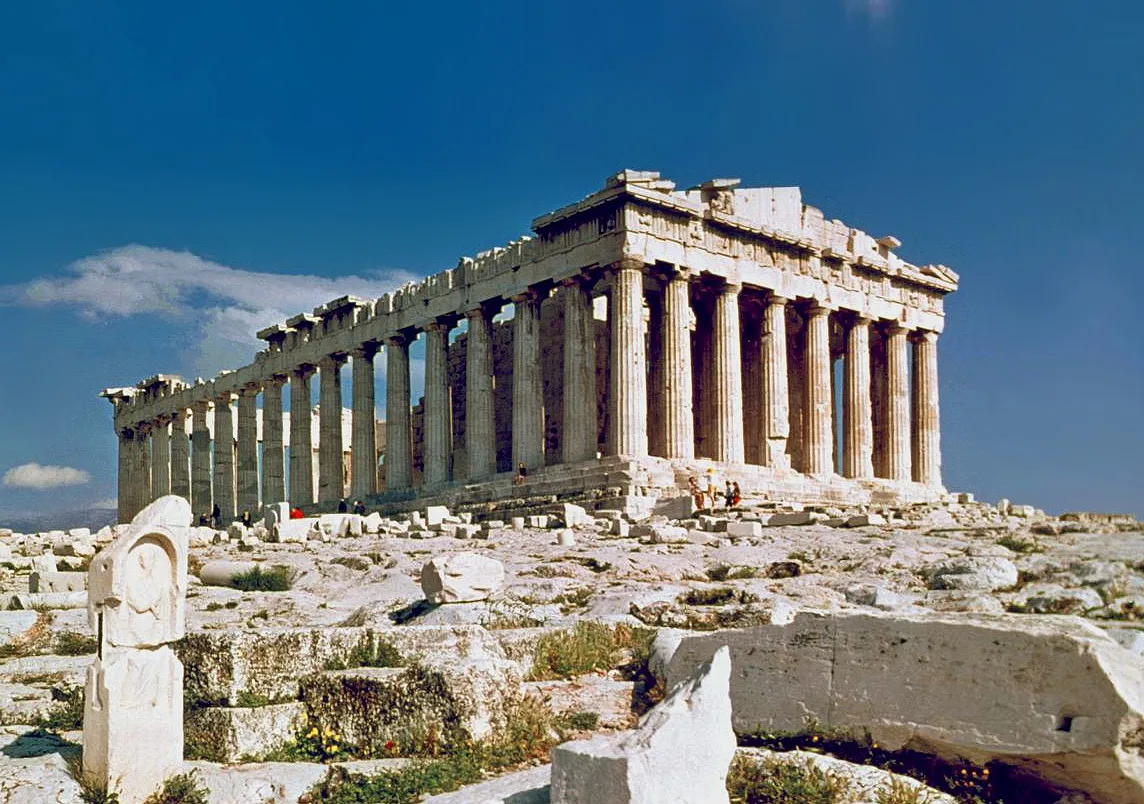 The Parthenon in Athens - A rectangular temple of pale Pentelic marble crowning the Acropolis hill, ringed by massive...