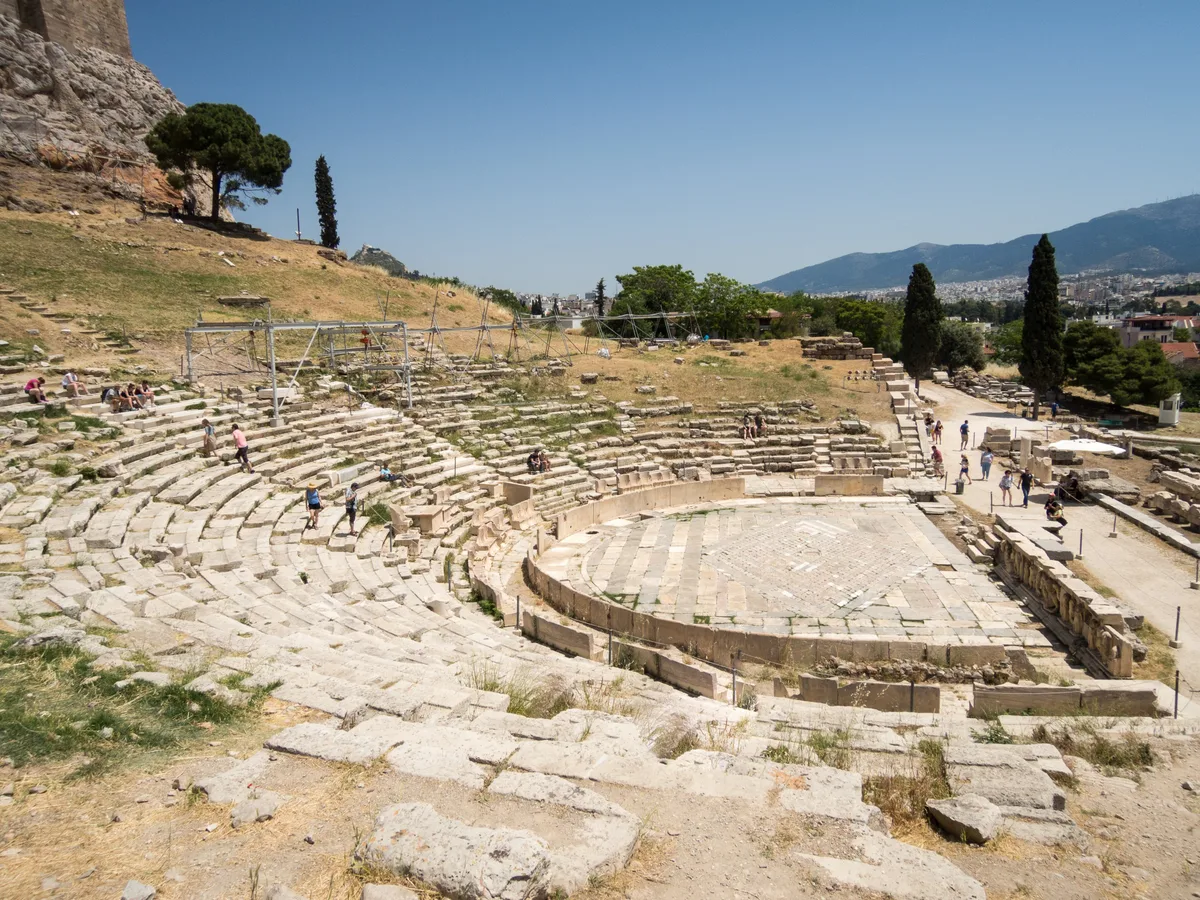Theatre of Dionysus in Athens - A large semicircular stone theatre carved into the southern slope of the Acropolis...
