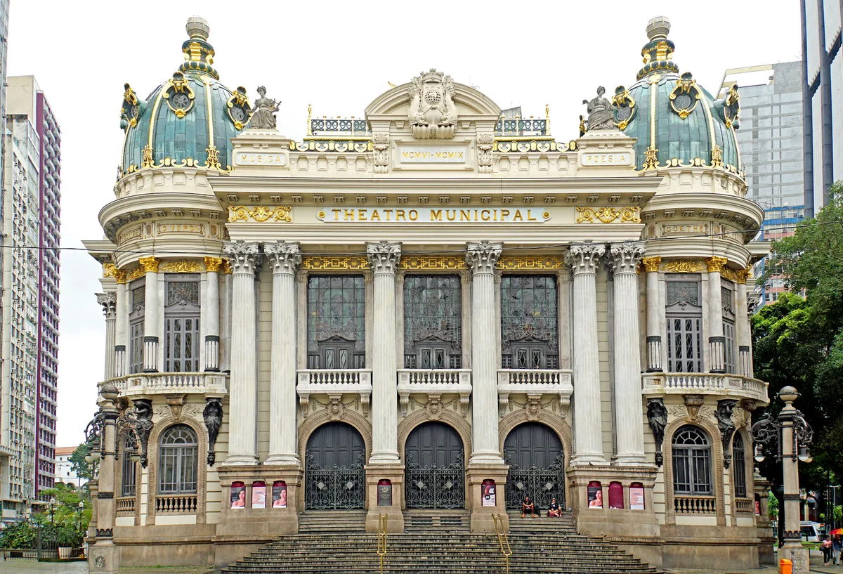 Theatro Municipal in Rio de Janeiro - A magnificent Belle Époque opera house with a richly sculpted facade, a central...