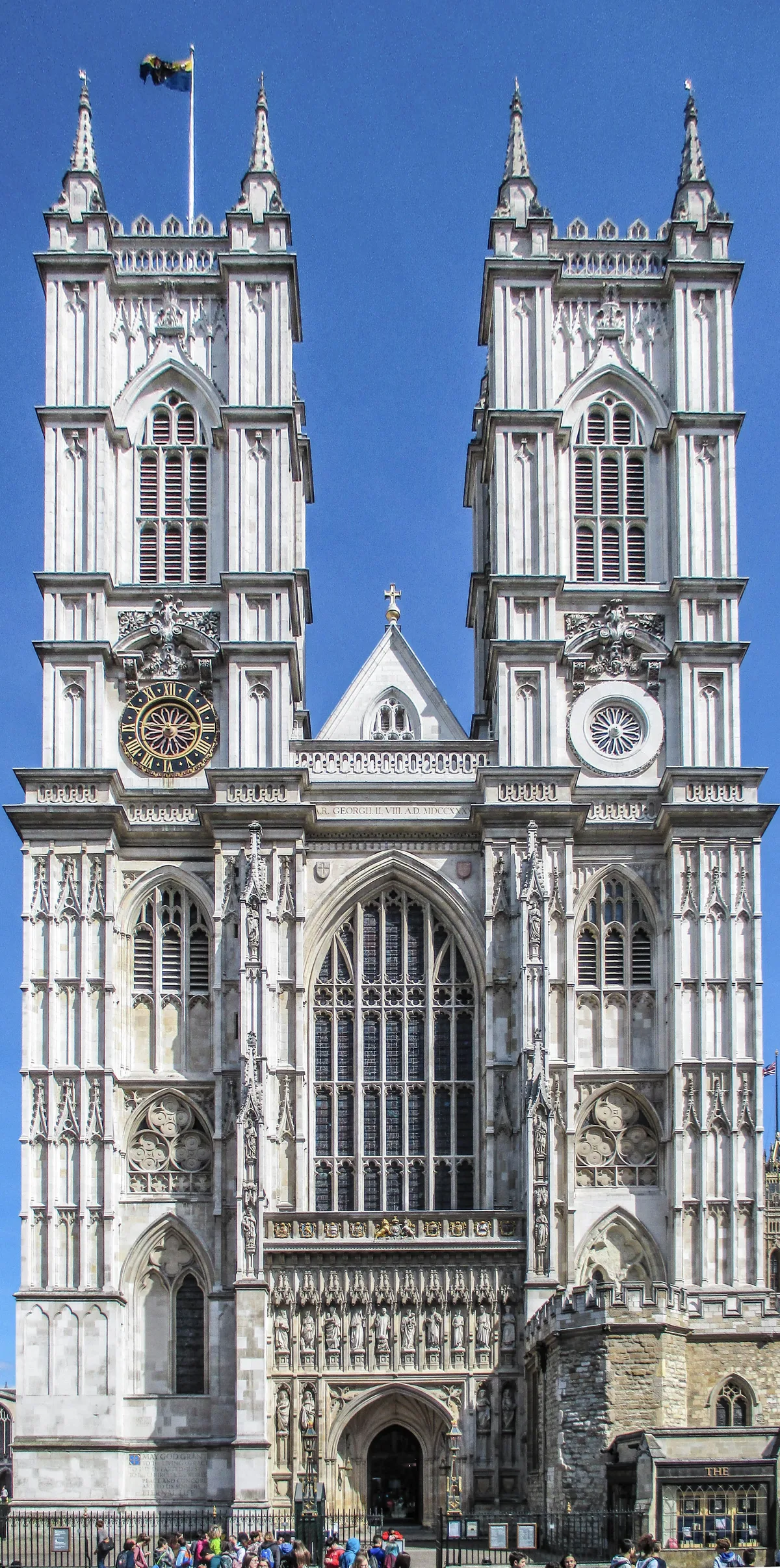 Westminster Abbey in London - A soaring Gothic abbey with twin towers, flying buttresses, and a stunning fan-vaulted...